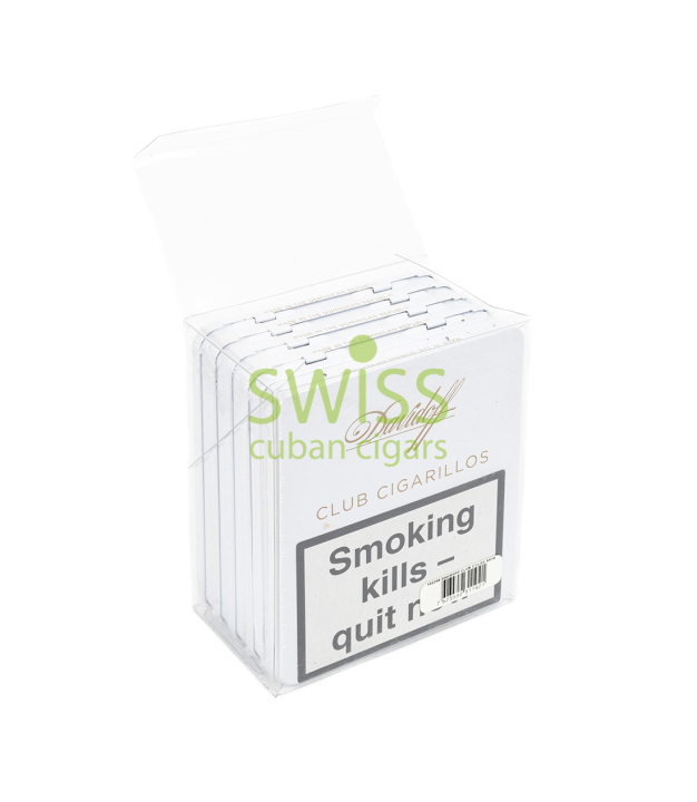 白いディスプレイ箱を開け、淡い緑で「SWISS」と印字。中に細い白いパックが並び、黒枠の英語健康警告が目立つ。